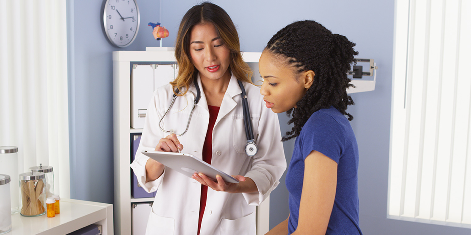 physician- engagement Physician engaging with patient